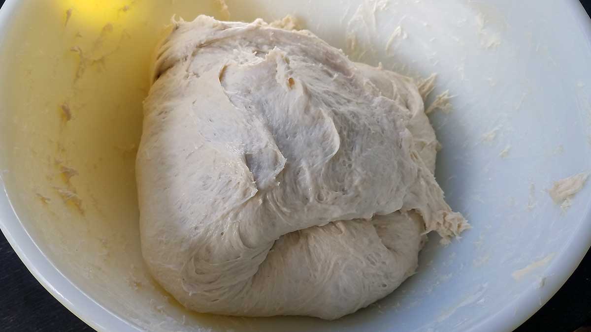 Stretch and fold method for making cuban bread dough.