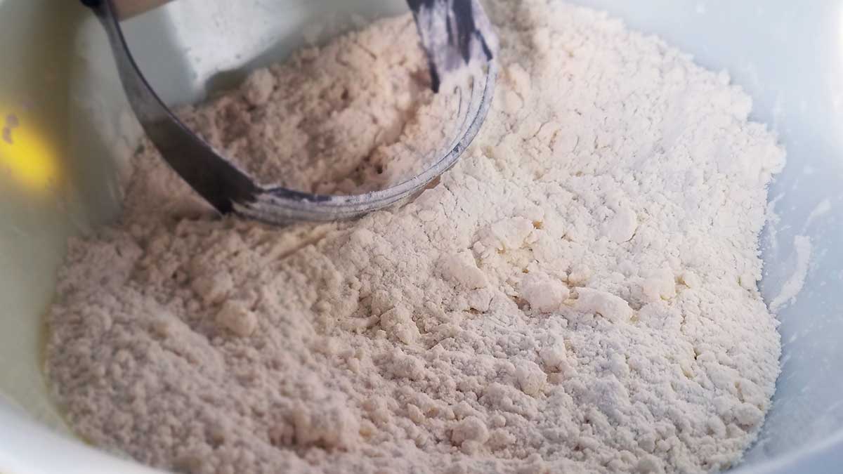 Measure ingredients by weight for cuban bread.