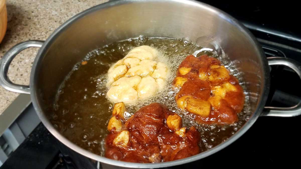 Frying apple fritters
