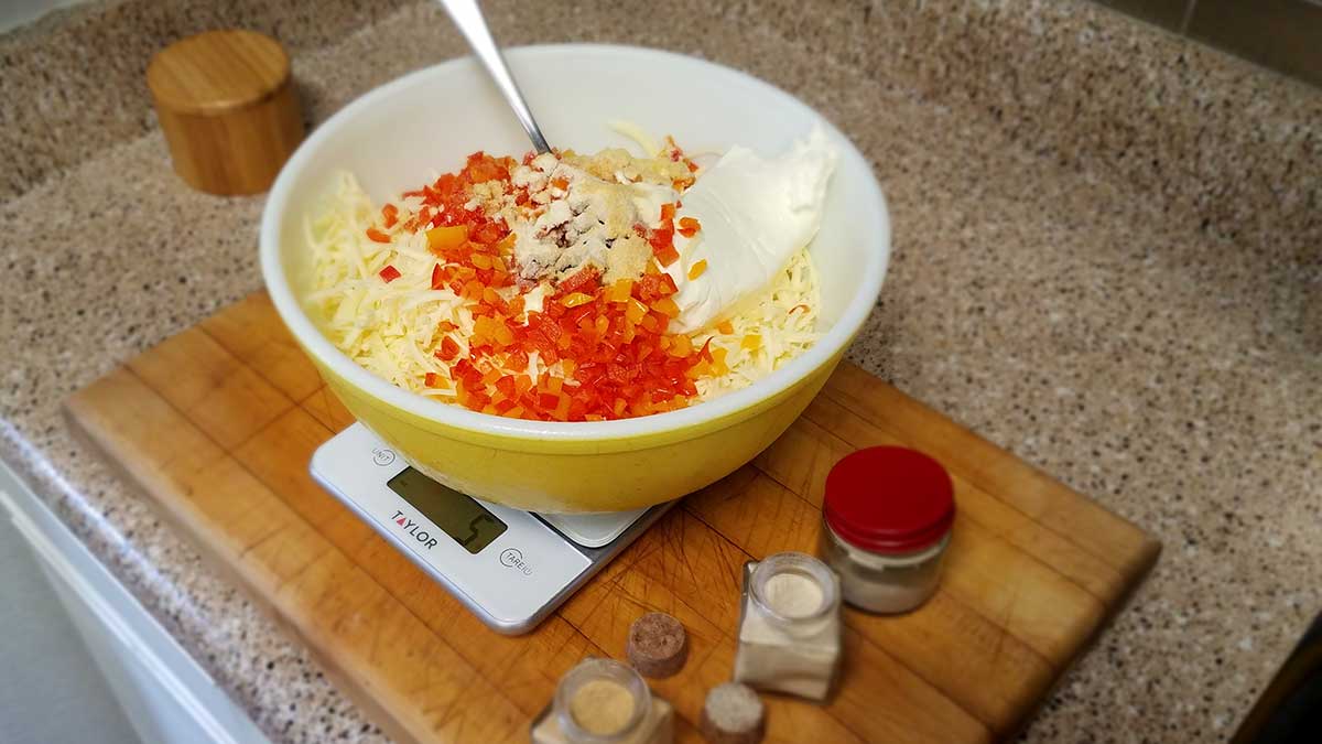 Mixing ingredients for pimento cheese